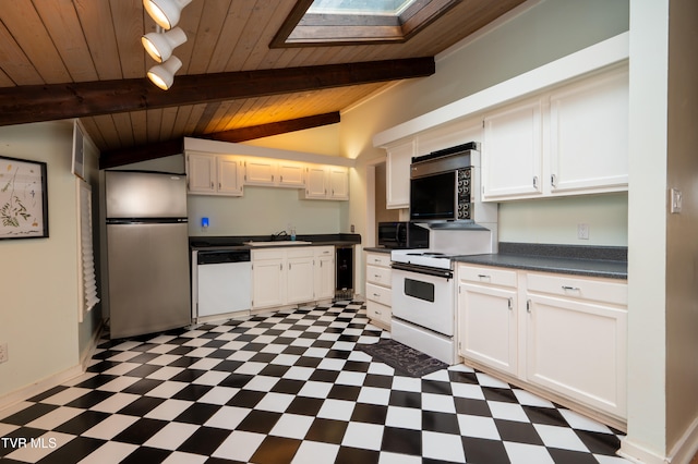 kitchen featuring sink, lofted ceiling with skylight, white appliances, white cabinets, and wood ceiling