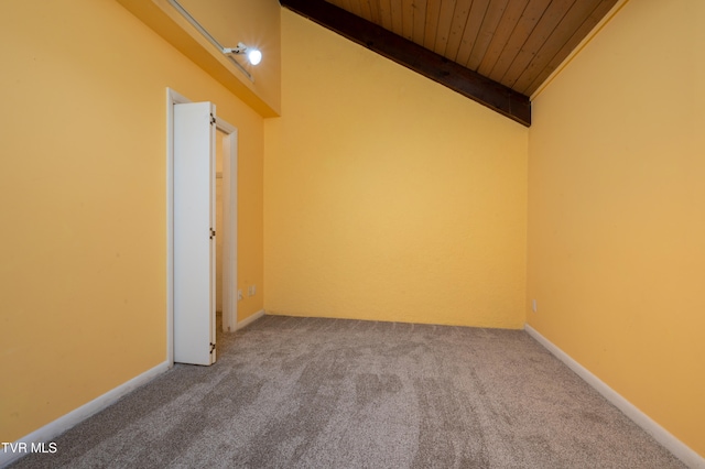 carpeted empty room with beamed ceiling, wooden ceiling, and high vaulted ceiling