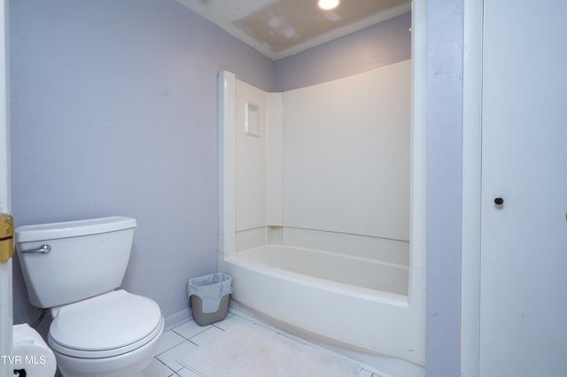 bathroom featuring tile patterned flooring and toilet