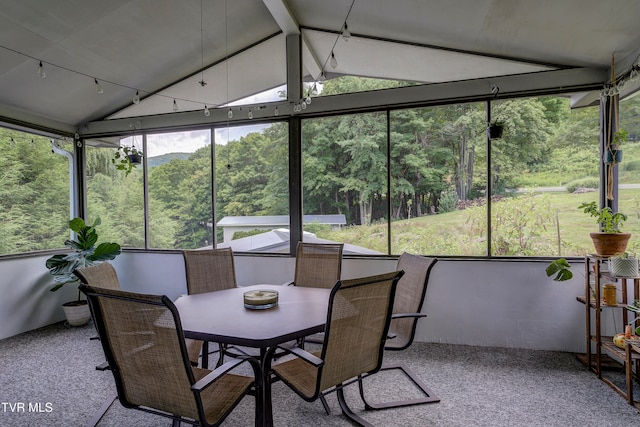 sunroom with vaulted ceiling