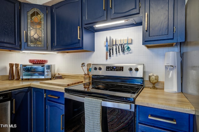 kitchen featuring decorative backsplash, blue cabinets, and appliances with stainless steel finishes