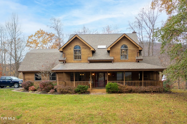 view of front of home featuring a porch and a front lawn