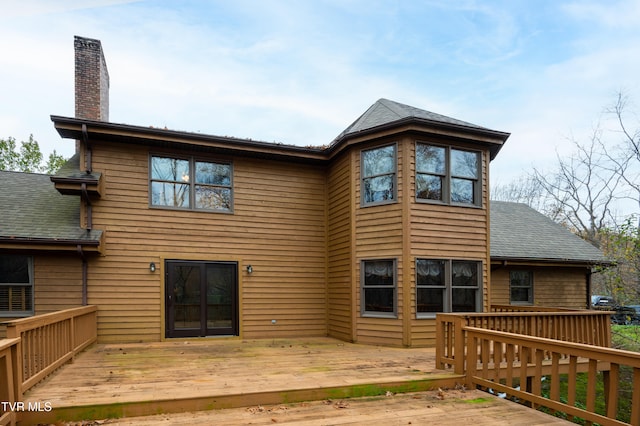 rear view of property with a deck