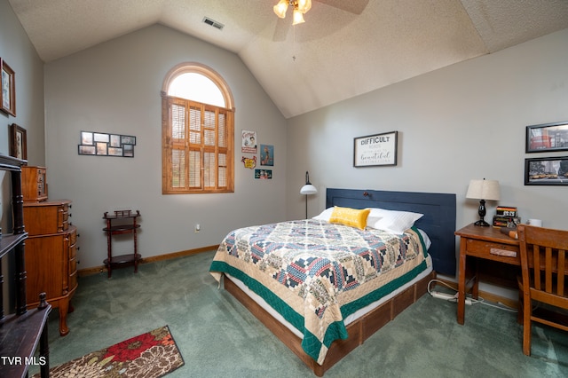 carpeted bedroom featuring a textured ceiling, vaulted ceiling, and ceiling fan