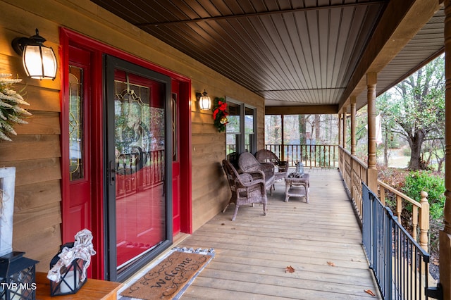 wooden deck featuring a porch