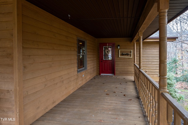 property entrance with covered porch