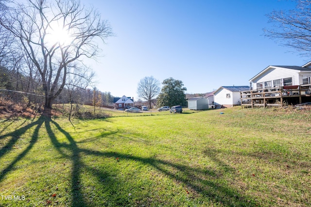 view of yard with a deck