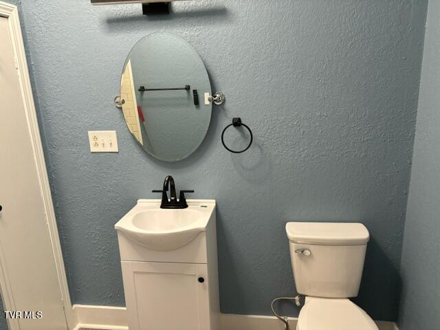 911 Russell St, Bristol, VA 24201 - bathroom with vanity and toilet