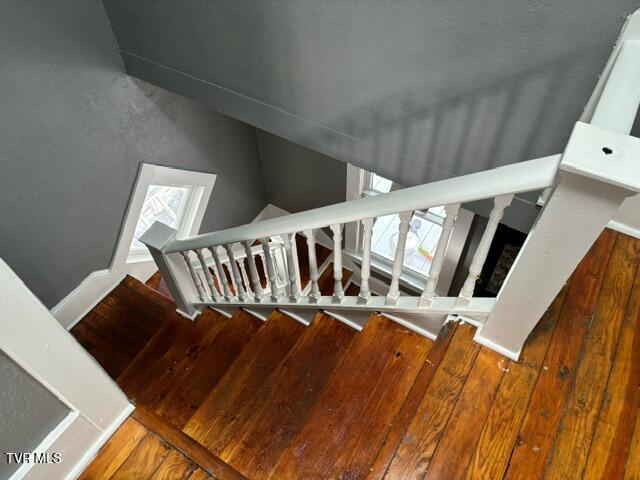 911 Russell St, Bristol, VA 24201 - staircase with lofted ceiling and wood finished floors