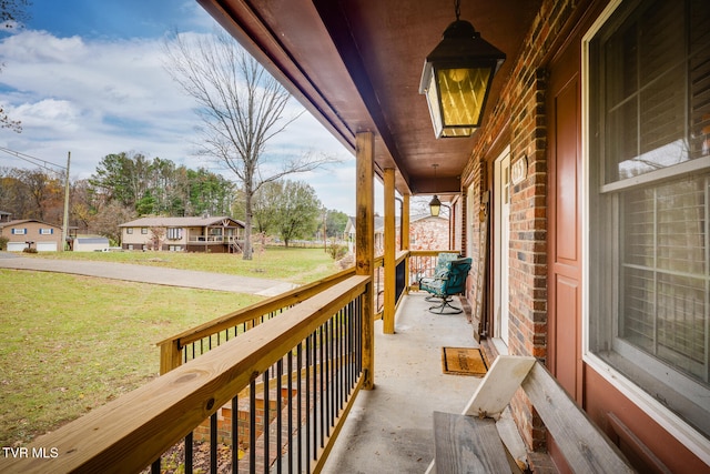 balcony featuring a porch