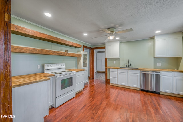 kitchen featuring butcher block counters, white cabinetry, dishwasher, white range with electric stovetop, and wood-type flooring