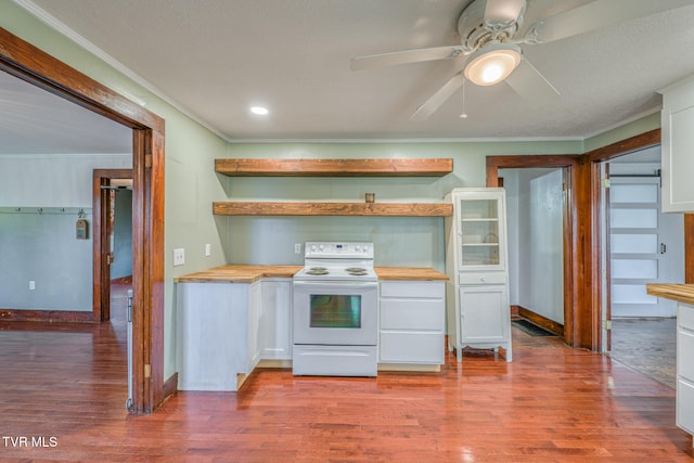 kitchen featuring ceiling fan, wood counters, white range with electric stovetop, white cabinets, and hardwood / wood-style flooring