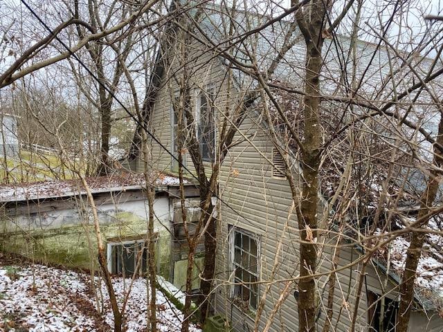 view of snow covered property