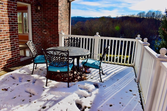 view of snow covered deck