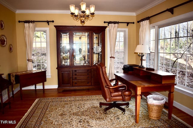 office area featuring dark hardwood / wood-style floors, an inviting chandelier, and ornamental molding