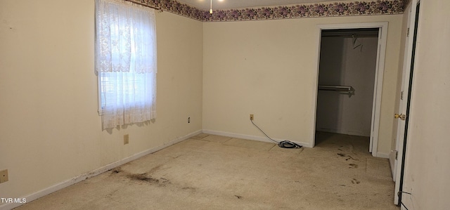 unfurnished bedroom with a closet