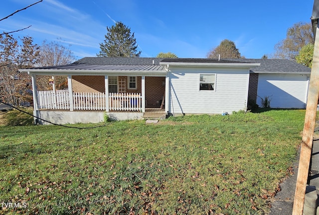 20286 Shadowood Cir, Meadowview, VA 24361 - back of property featuring brick siding, a yard, and covered porch