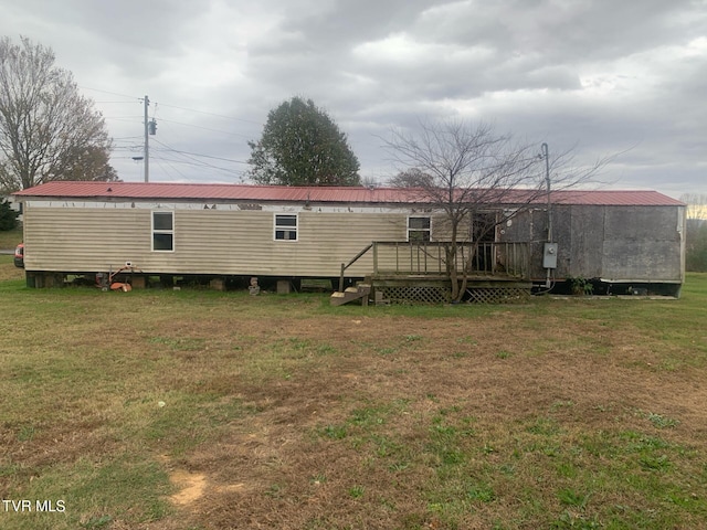 2260 Susong Memorial Rd, Greeneville, TN 37743 - rear view of house featuring a deck and a yard