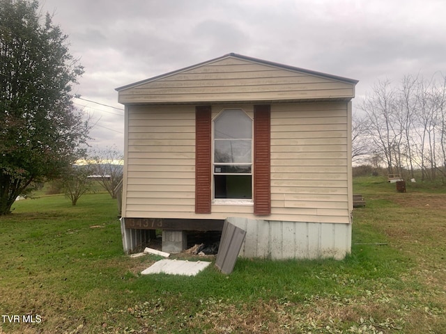 2260 Susong Memorial Rd, Greeneville, TN 37743 - view of side of home with a yard