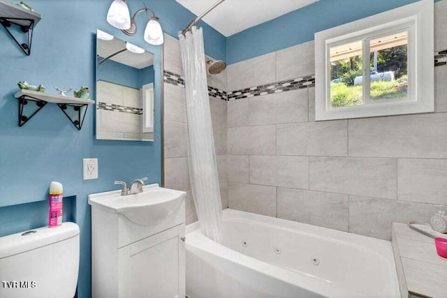 full bathroom with shower / tub combo, vanity, and toilet