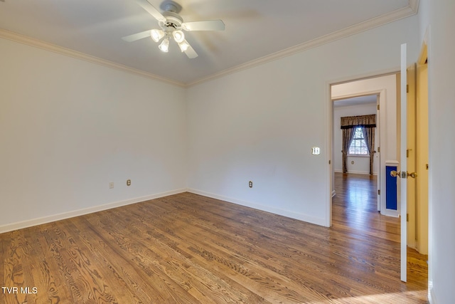 unfurnished room with hardwood / wood-style floors, ceiling fan, and ornamental molding