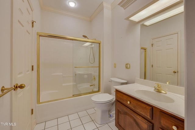 full bathroom featuring tile patterned flooring, toilet, shower / bath combination with glass door, vanity, and ornamental molding