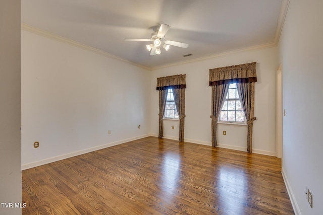 spare room featuring hardwood / wood-style floors, ceiling fan, and crown molding