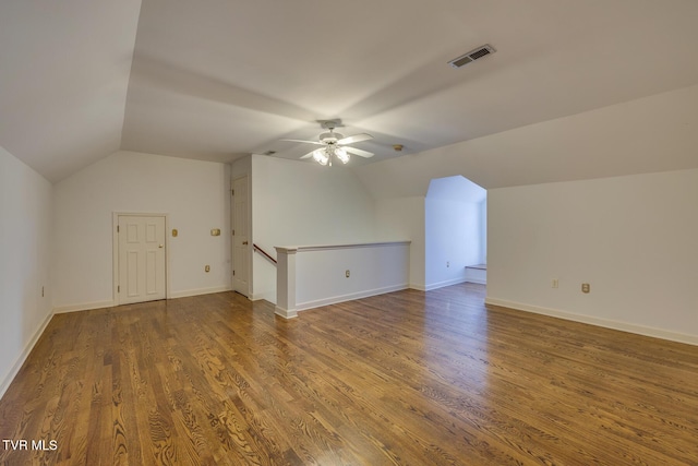 bonus room featuring hardwood / wood-style floors, ceiling fan, and lofted ceiling