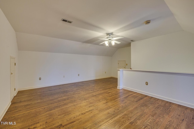 bonus room featuring ceiling fan, wood-type flooring, and vaulted ceiling