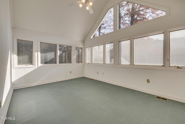 unfurnished sunroom featuring vaulted ceiling and ceiling fan