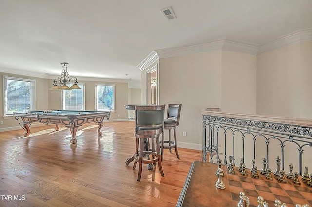 playroom featuring crown molding, billiards, and light hardwood / wood-style flooring