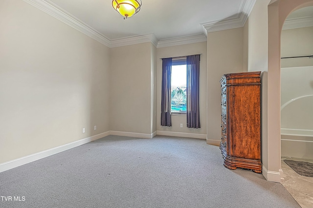 carpeted empty room with ornamental molding