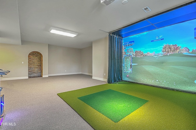 rec room with carpet flooring and golf simulator