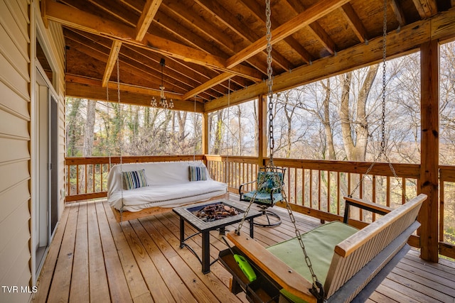 deck featuring a fire pit