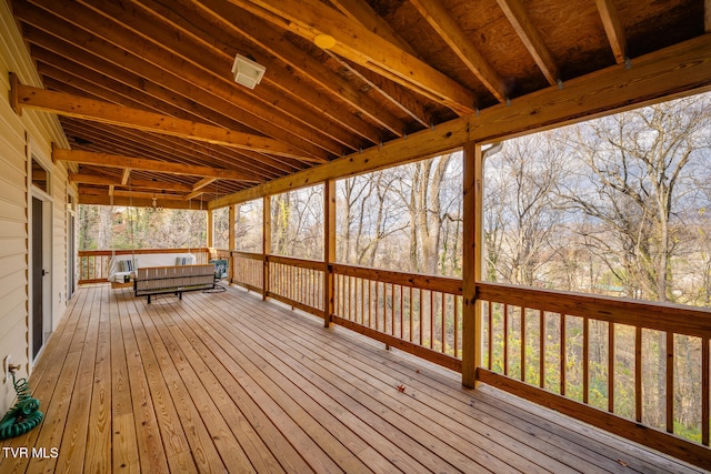 wooden deck featuring outdoor lounge area