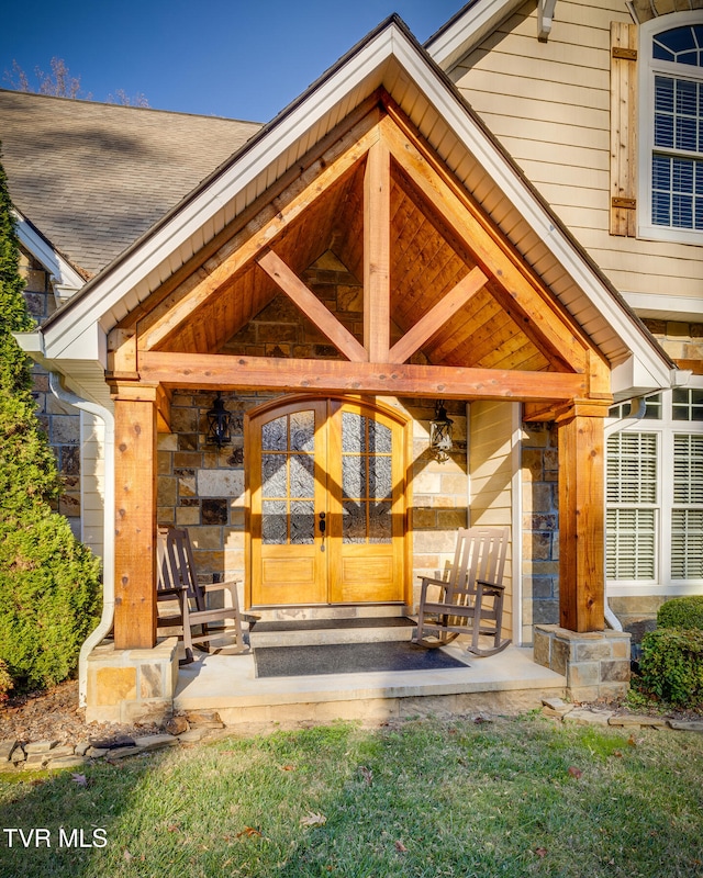 entrance to property with covered porch