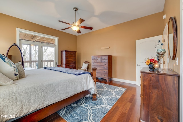 bedroom featuring ceiling fan, access to exterior, and hardwood / wood-style floors