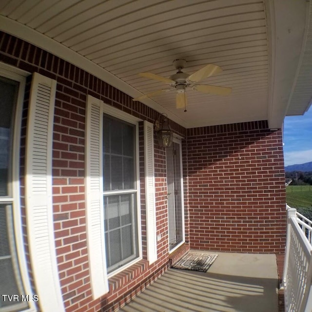 balcony featuring ceiling fan