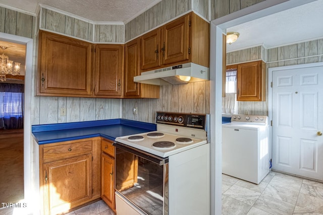 kitchen with white range with electric stovetop, washer / clothes dryer, crown molding, a chandelier, and a textured ceiling