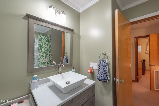 bathroom featuring vanity and ornamental molding