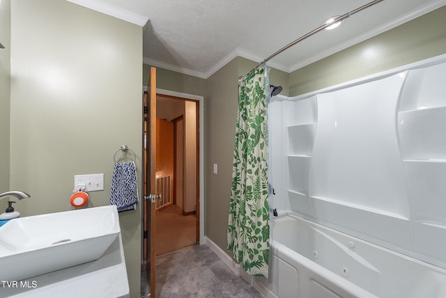 bathroom with a textured ceiling, crown molding, shower / bathtub combination with curtain, and sink