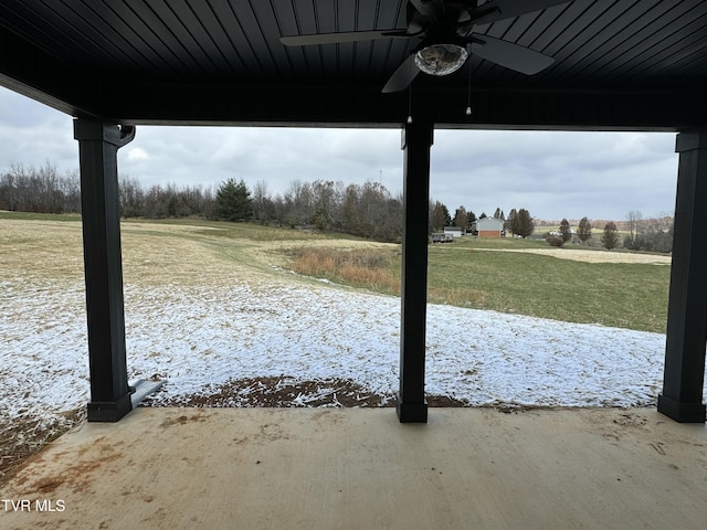 view of yard with ceiling fan