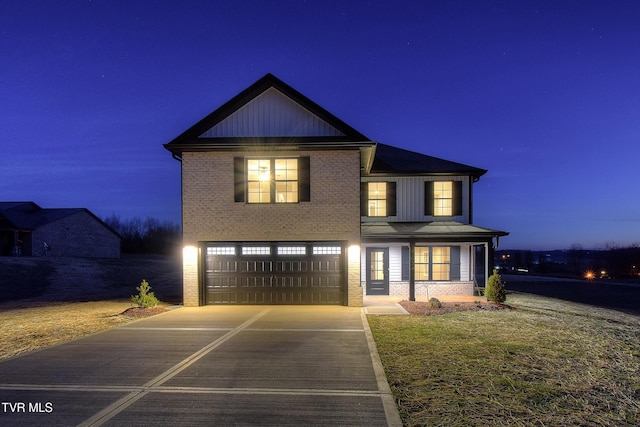 view of front of property featuring a garage