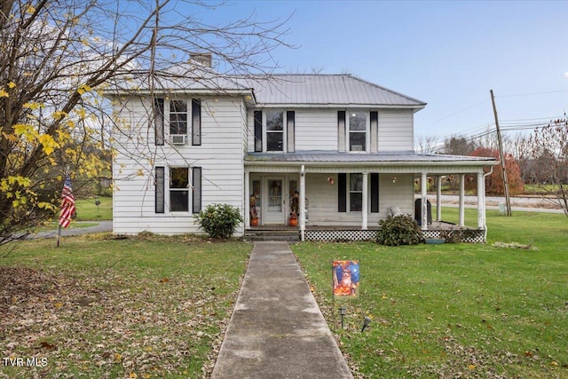 104 Maple St, Glade Spring, VA 24340 - view of front of house featuring a porch, metal roof, and a front yard