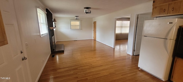 hallway featuring light hardwood / wood-style flooring