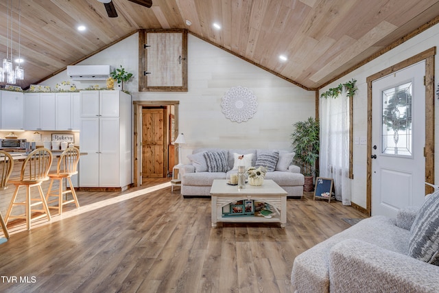 living room with a wall unit AC, ceiling fan, wooden walls, wooden ceiling, and light hardwood / wood-style floors