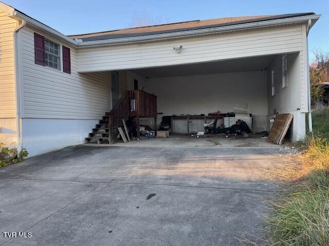 garage with a carport