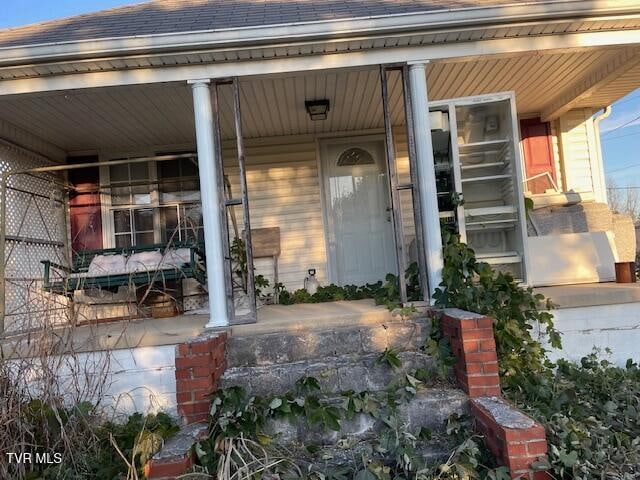 property entrance with a porch