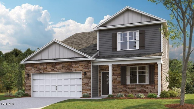 view of front facade with a garage and a front yard