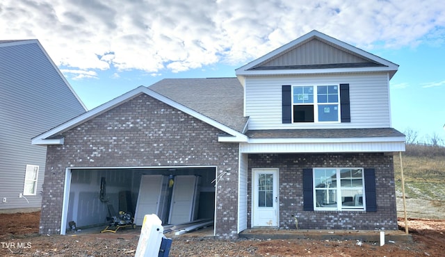 1711 Fox Meadows Cir, Bluff City, TN 37618 - view of front facade featuring a garage, brick siding, and a shingled roof